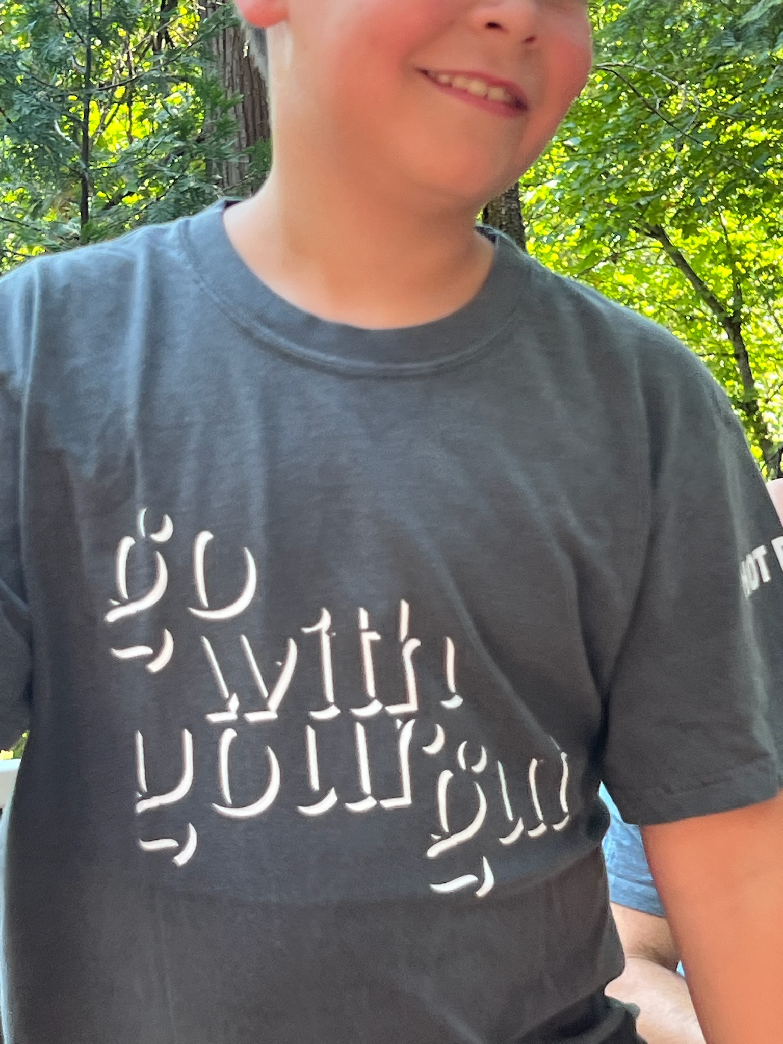 “go with your gut” t-shirt worn outdoors