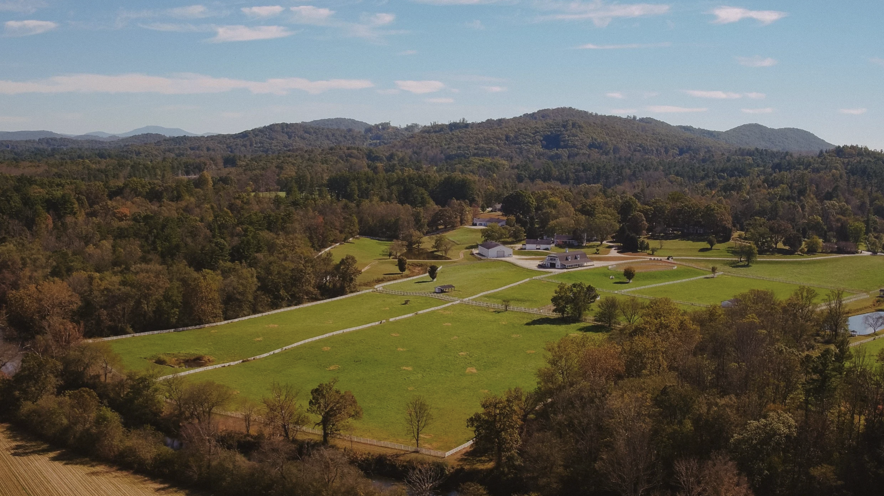 Aerial view of the farm paddocks and hills