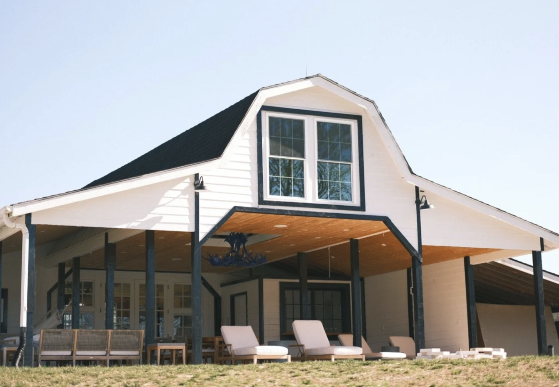Pool house barn with navy trim