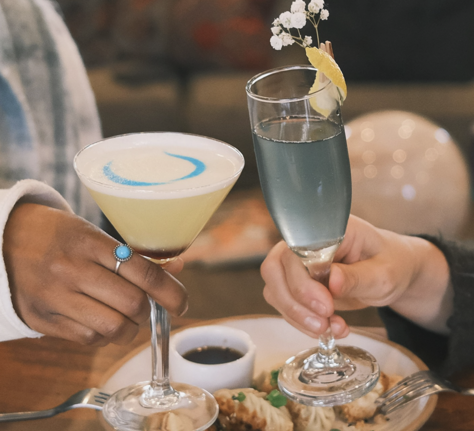 Cocktail topped with a blue horseshoe
