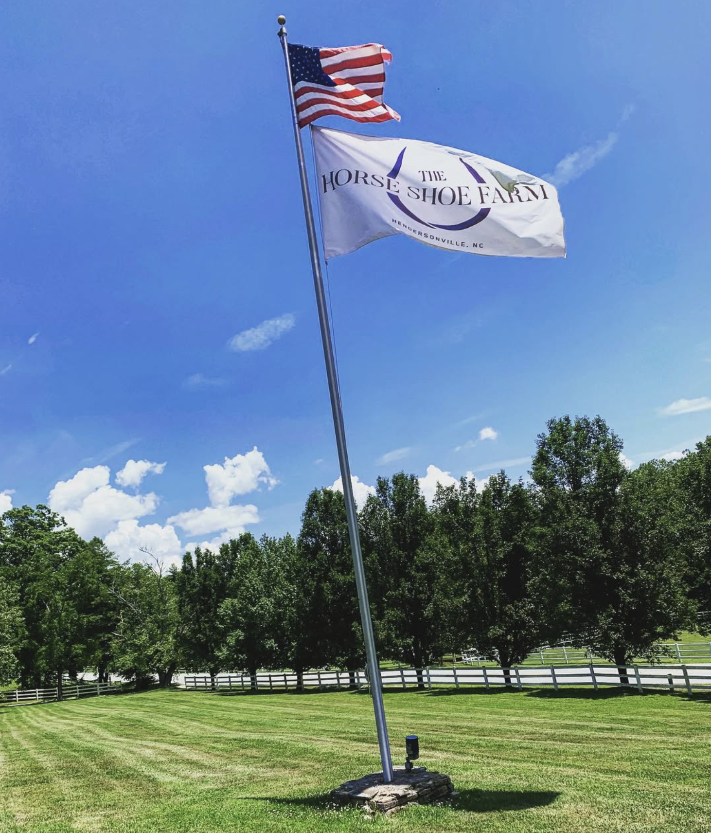 Horse Shoe Farm flag over the lawn