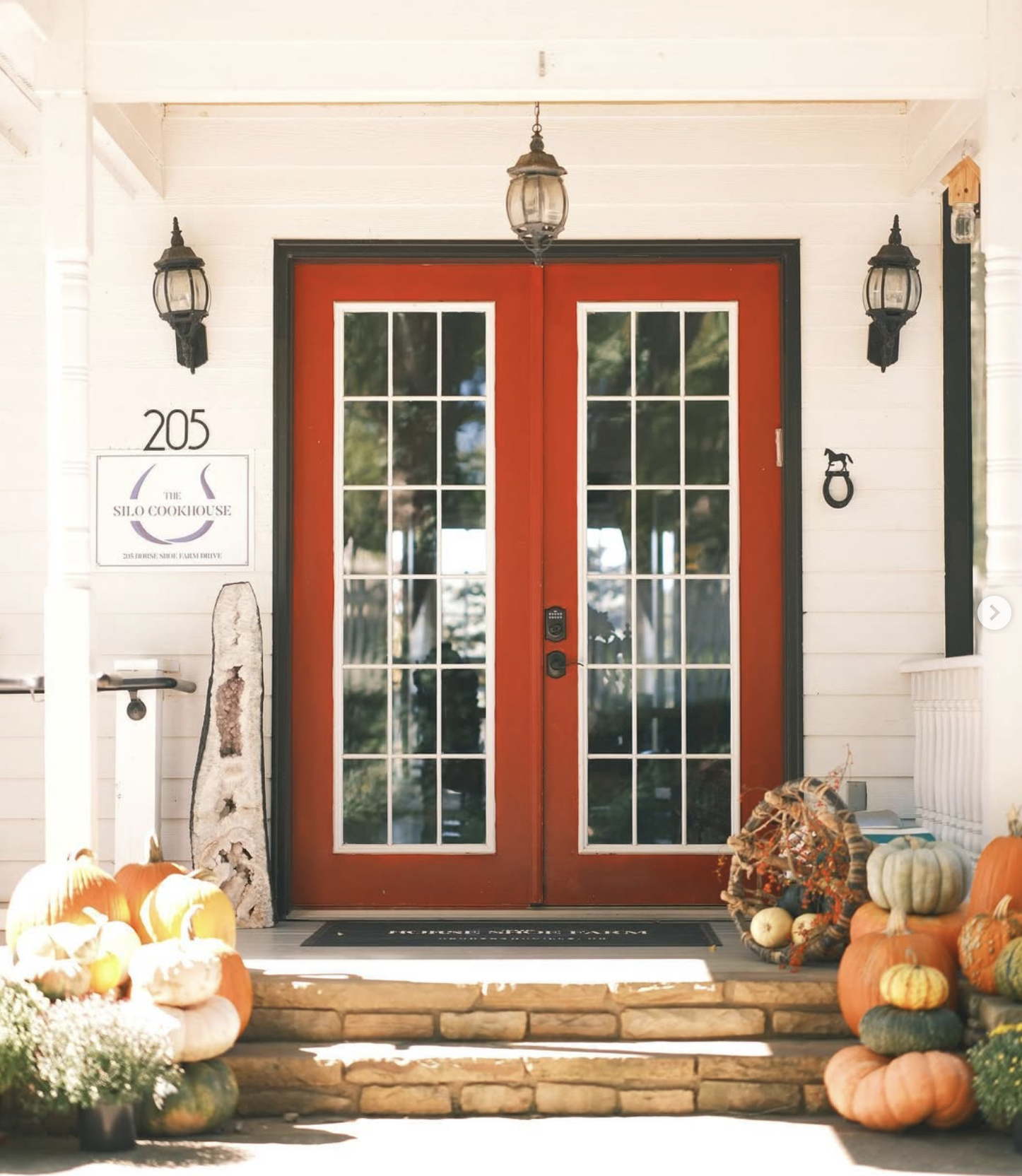 The Silo Cookhouse entrance with autumn pumpkins