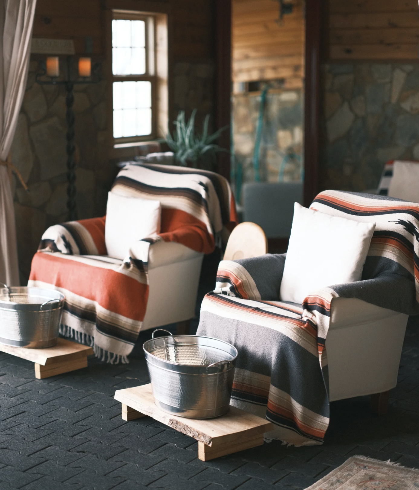 Pedicure chairs with striped blankets