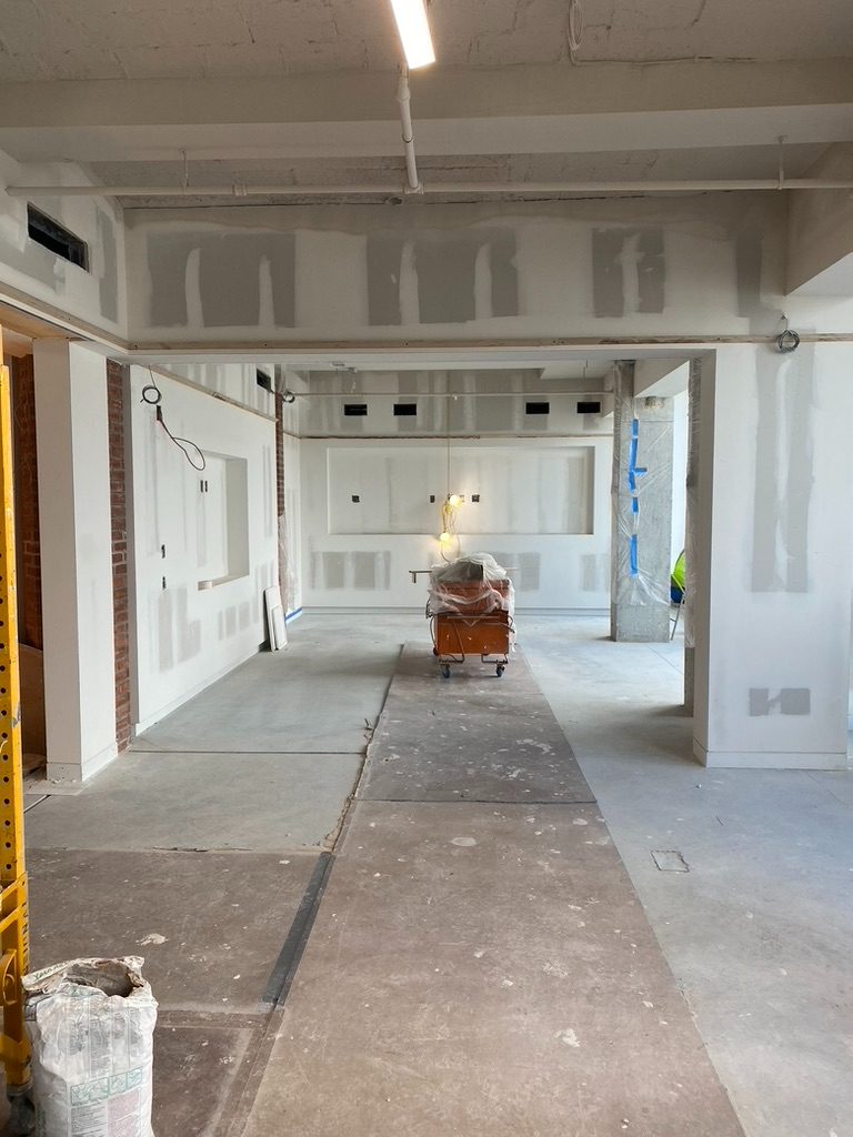 Office build-out, river-facing corner in progress